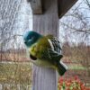 Vrolijk vogelhuisje van keramiek