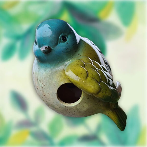 Vrolijk vogelhuisje van keramiek