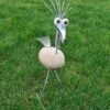 Metalen wiebelvogel van echt steen