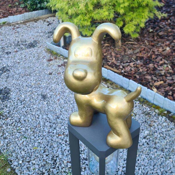 Snoopy vrolijk tuinbeeld met een hart van goud