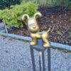 Snoopy vrolijk tuinbeeld met een hart van goud