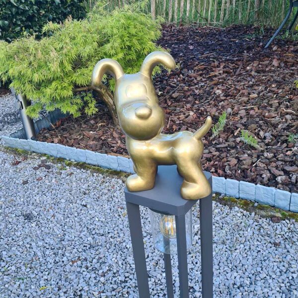Snoopy vrolijk tuinbeeld met een hart van goud