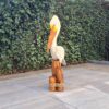 Super grote houten pelikaan op stronk
